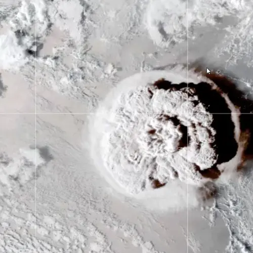 Still shot from a looping video showing an umbrella cloud generated by the underwater eruption of the Hunga Tonga-Hunga Ha’apai volcano on Jan. 15, 2022. The GOES-17 satellite captured the series of images that also show crescent-shaped shock waves and lightning strikes. Credit: NASA Earth Observatory image by Joshua Stevens using GOES imagery courtesy of NOAA and NESDIS.