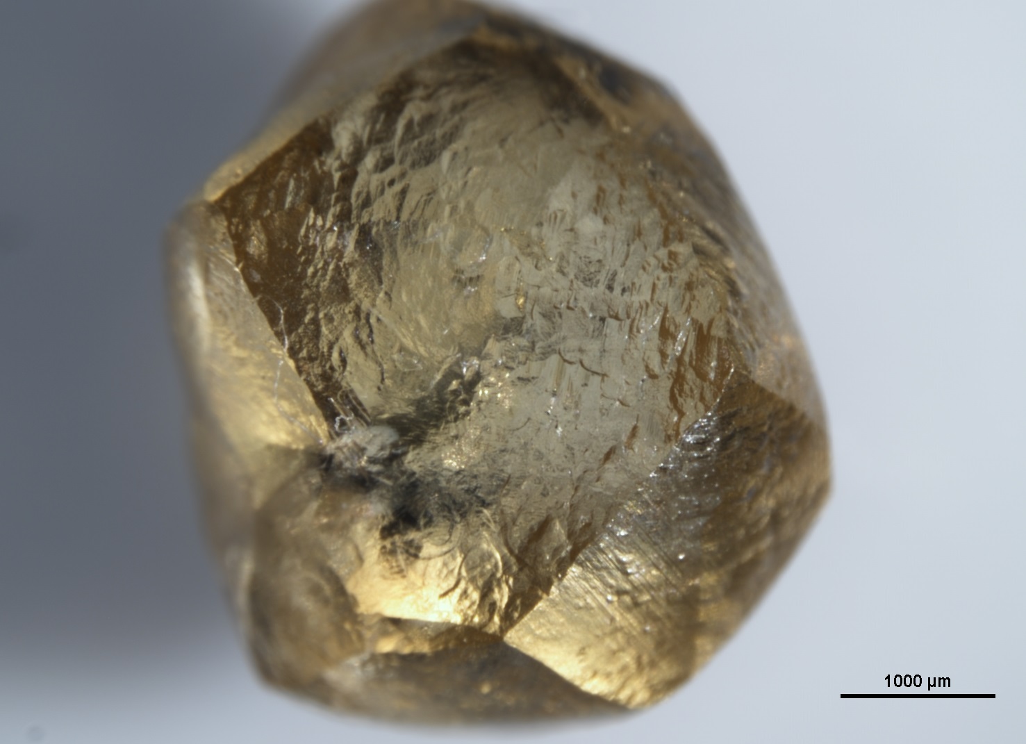 Images of diamonds from Sierra Leone with sulfur-containing mineral inclusions courtesy of the Gemological Institute of America