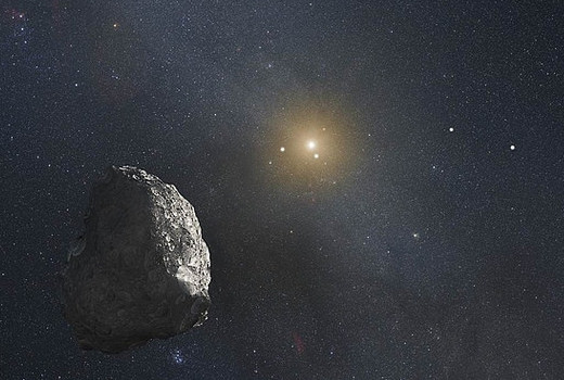 This is an artist’s impression of a Kuiper Belt object, located on the outer rim of our solar system at a staggering distance of 4 billion miles from the Sun. (Credit: NASA, ESA, and G. Bacon (STScI))