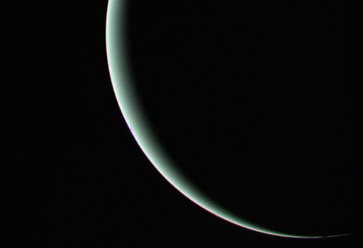 The view of Uranus recorded by Voyager 2 on January 25, 1986, as the spacecraft left the planet behind and set forth on the cruise to Neptune.