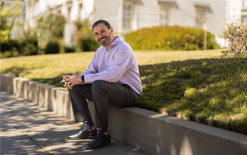 John Mulchaey sits in front of the Carnegie Science Observatories offices in Pasadena