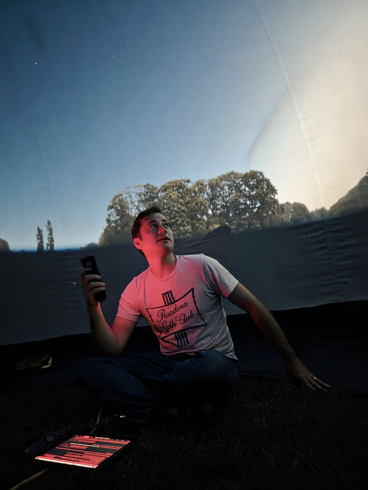 Observatories Outreach Coordinator Jeffrey Rich performs a show in the Inflatable Planetarium.