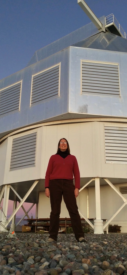 Alycia Weinberger in front of Magellan Telescope