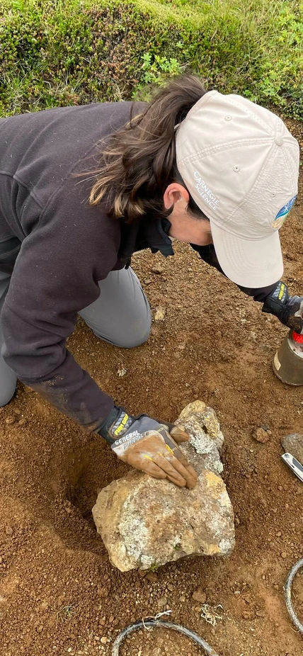 Diana Roman works with a Quick Deploy Box (QDB) at a research site in Iceland