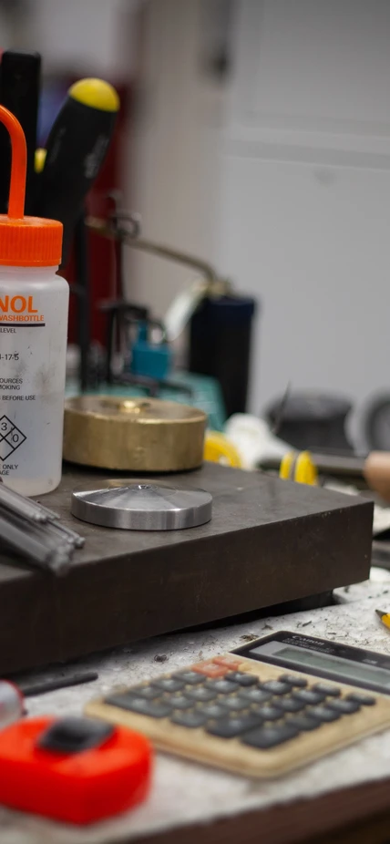 Machine shop desk filled with equipment