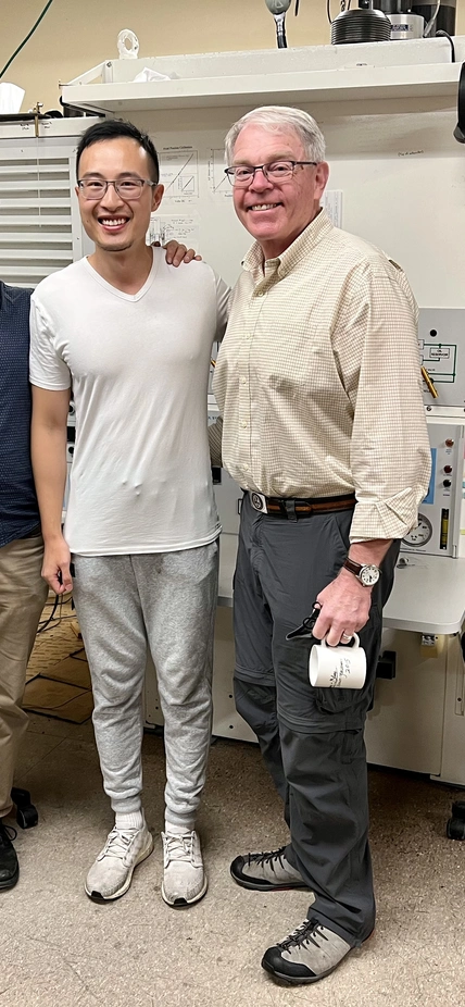 Ningli Zhao in the Rock Deformation Lab at Brown University. From left to right, Greg Hirth, Ningli Zhao, and Reid Cooper.