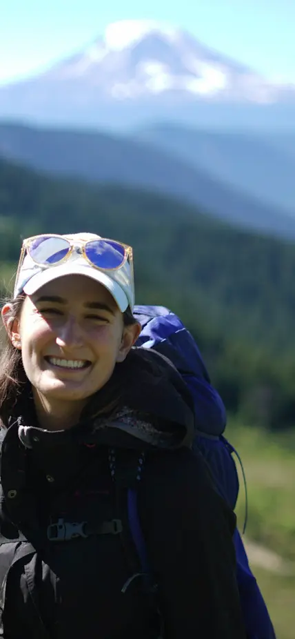 Tara Shreve infront of a volcano 