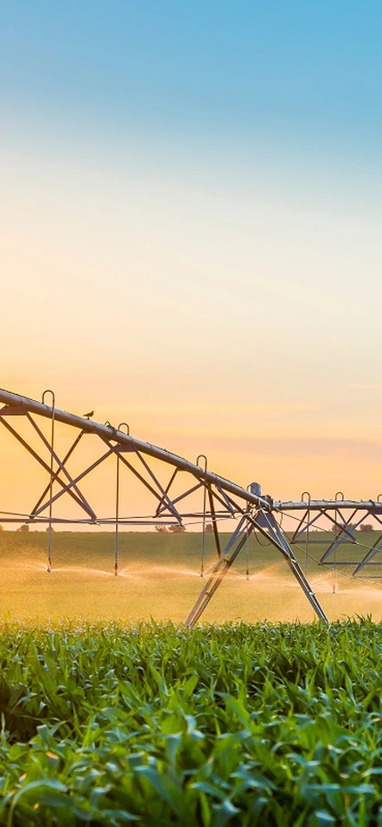 Irrigation being deployed in a field. Image purchased from Shutterstock.
