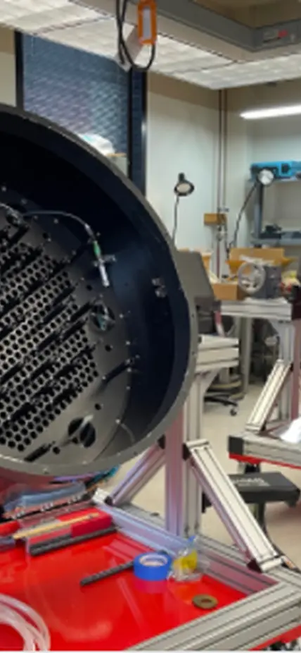 The twin FPS units (prior to robot installation). One of these goes to Carnegie's Las Campanas Observatory in the Southern Hemisphere and the other goes to Apache Point Observatory in the Northern hemisphere. Credit: The SDSS collaboration.