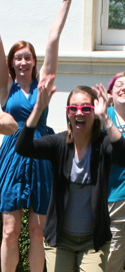 Observatories postdocs jumping in celebration