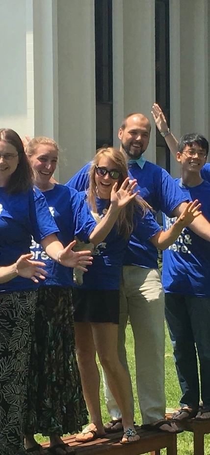 Observatories postdocs goofing around in the back garden in matching Carnegie-branded March for Science 2017 tee-shirts. 