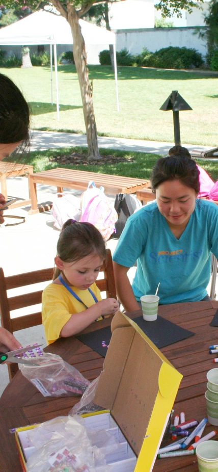 Summer students lead STEM activity.