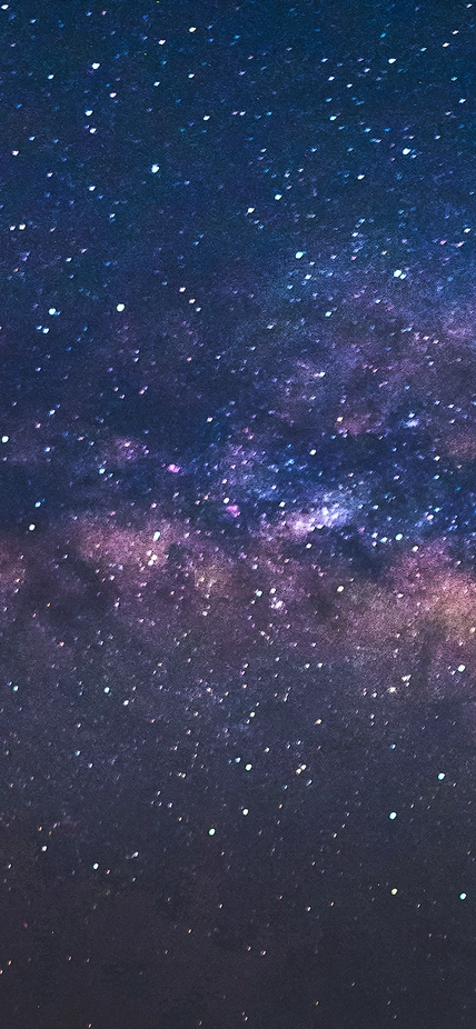 The Milky Way is visible in a starry sky. 