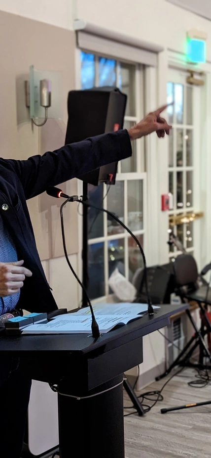 Mike Walter Speaking at Podium