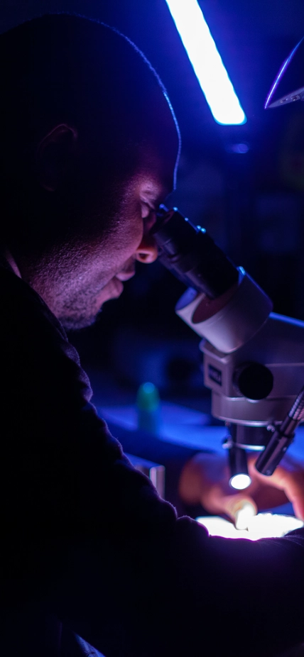 Innocent Ezenwa at Microscope