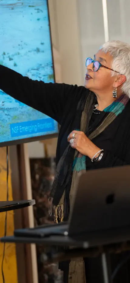 Devaki Bhaya Pointing to screen