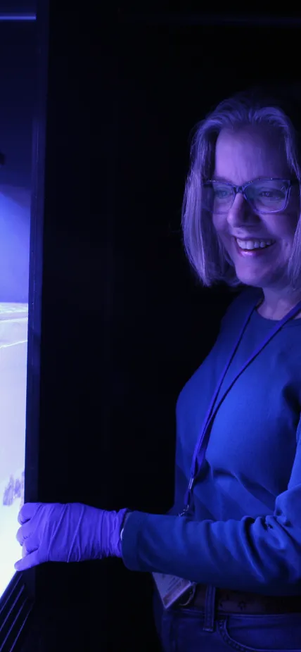 Lab Technician Lynne Hugendubler in coral facility
