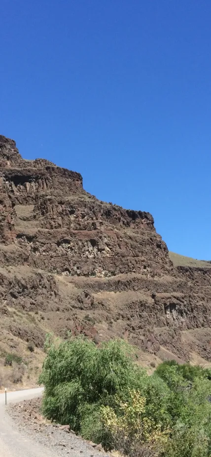 This pile of lava flows is part of the Grande Ronde Basalt, the most voluminous formation of the Columbia River Basalt Group (Photo credit: Jennifer Kasbohm).