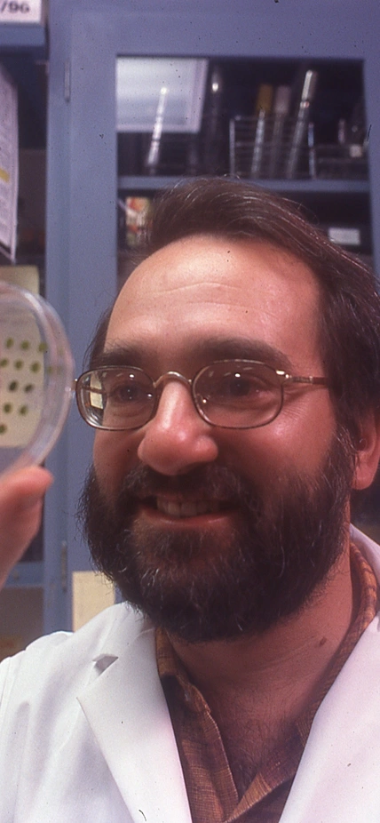 Arthur Grossman with a petri dish