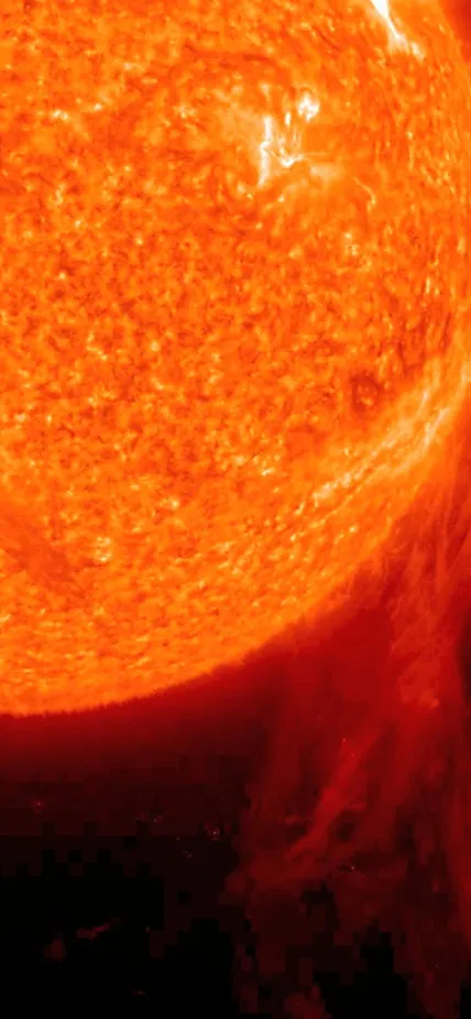 A very long solar filament that had been snaking around the Sun erupted (Dec. 6, 2010) with a flourish. Credit: NASA/GSFC/SOHO  