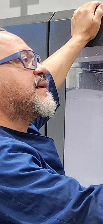 Jerson Castillo at work in the Observatories' Machine Shop.