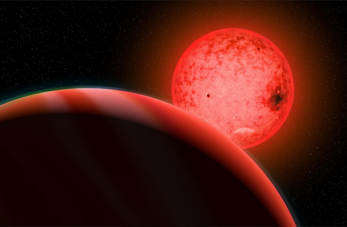 Artist's conception of a a large gas giant planet orbiting a small red dwarf star called TOI-5205. Image by Katherine Cain, courtesy of the Carnegie Institution for Science. 