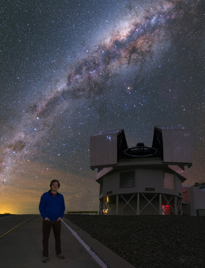 Carnegie–Princeton Fellow Andrew Newman pictured with one of the twin Magellan telescopes at Carnegie’s Las Campanas Observatory