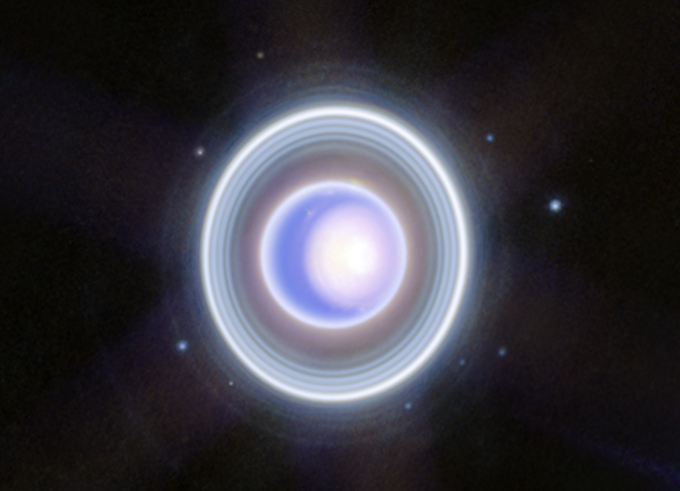 The James Webb Space Telescope's infrared view of Uranus reveals glowing polar caps, storm activity, and 11 of the planet’s 13 known rings. 