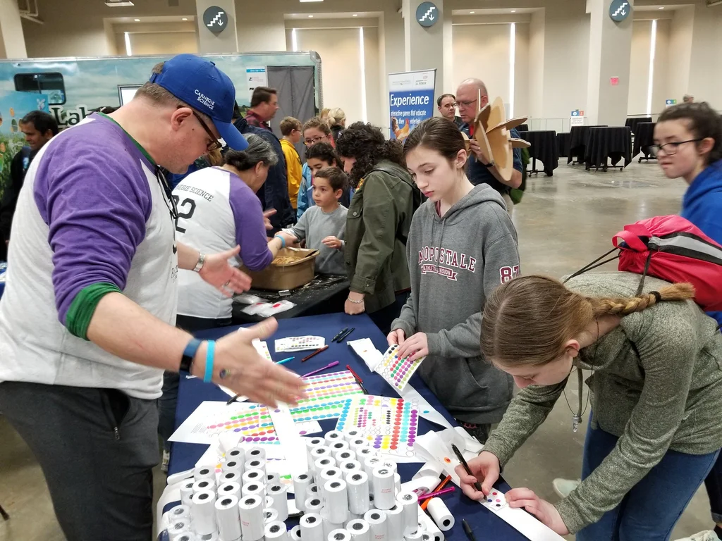 Making pocket Solar Systems at Carnegie's booth at the USA Science & Engineering Festival