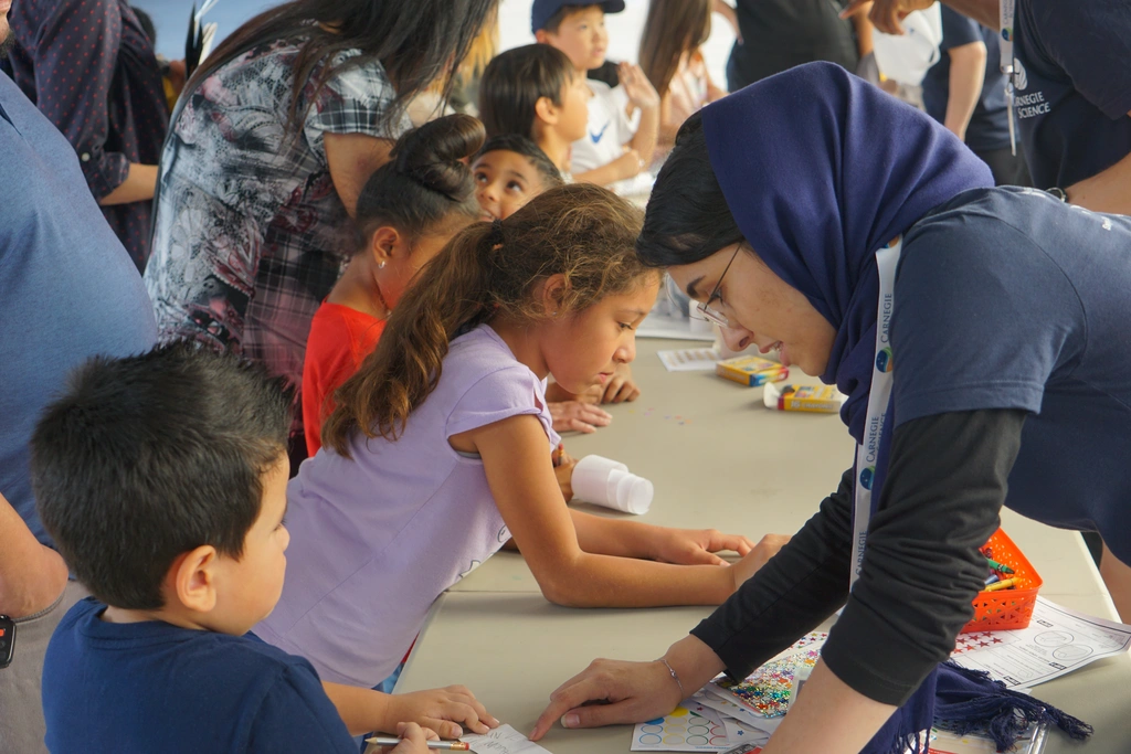 Young Open House attendees participate in an activity