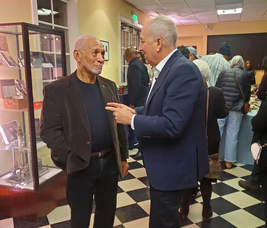 Former NASA Administrator Charles Bolden and Carnegie President Eric D. Isaacs converse during the pre-screening reception for The Space Race