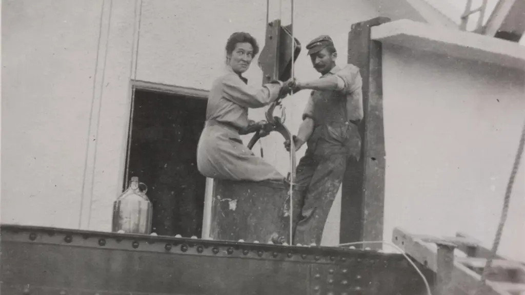 Phoebe Waterman Haas using a bucket lift to ascend the 150-foot solar tower at Mount Wilson Observatory