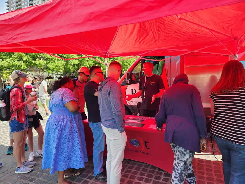 Carnegie Science astronomers do community outreach with a Perot Museum tech truck team