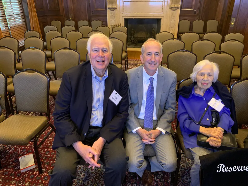 Richard Meserve, Eric Isaacs, and Maxine Singer at a book signing event for Robert Hazen