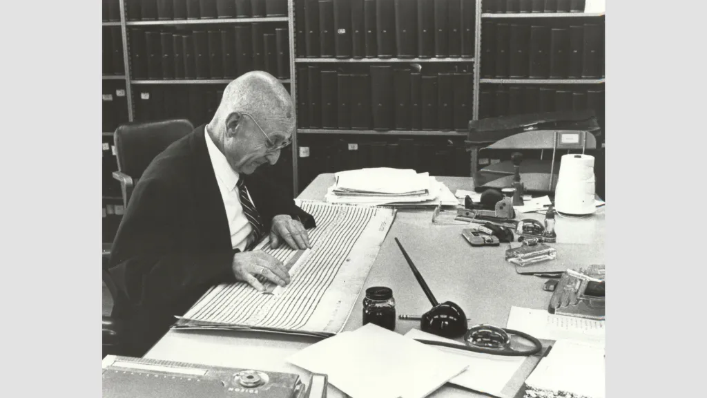 Beno Gutenberg studying a seismogram at the Seismology Lab. Credit: Caltech Archives