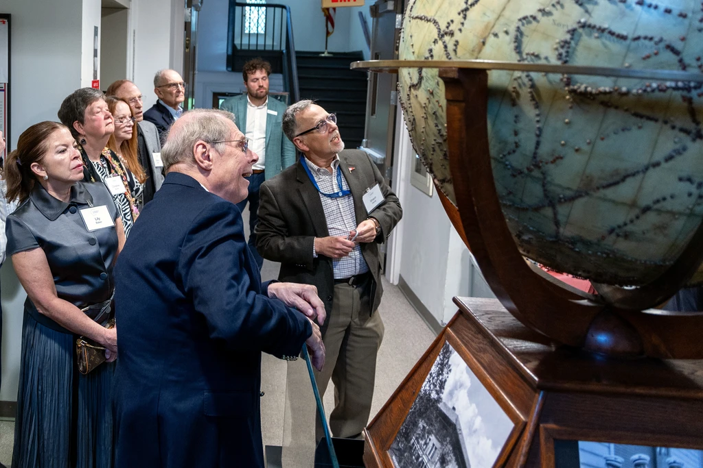Librarian Emeritus Shaun Hardy gives a history tour at the Earth & Planets Laboratory