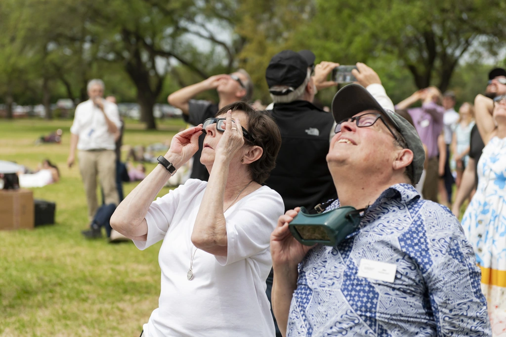 Carnegie Champions Cynthia Kurtz and Jim McDermott observe the 2024 Great North American Eclipse in Dallas, TX.