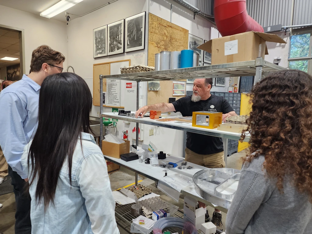 Machine Shop Foreman Vince Kowal gives a tour of the Observatories Machine Shop to CASSI interns. 