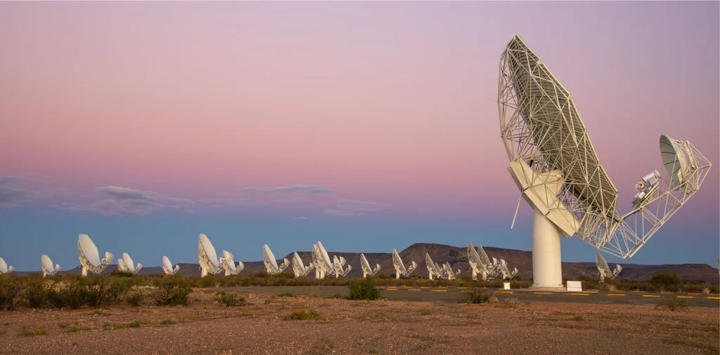 The MeerKAT telescope is an array of 64 interlinked receptors (a receptor is the complete antenna structure, with the main reflector, sub-reflector and all receivers, digitisers and other electronics installed).