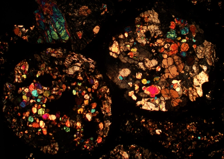 Meteorite thin section courtesy Nicole Xike Nie.