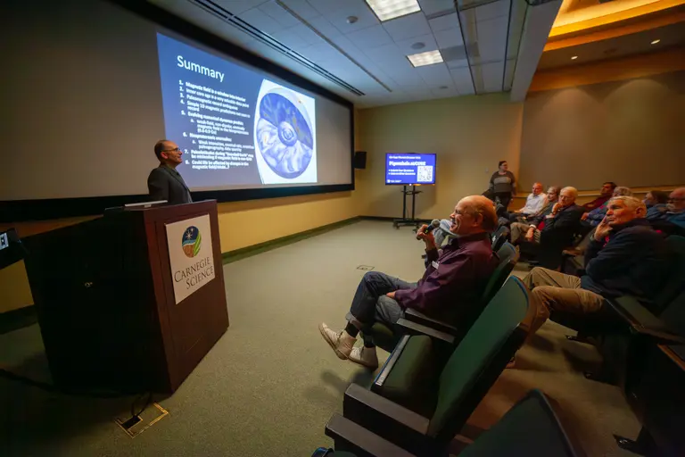 An audience member asks Driscoll a question at the end of his talk. 