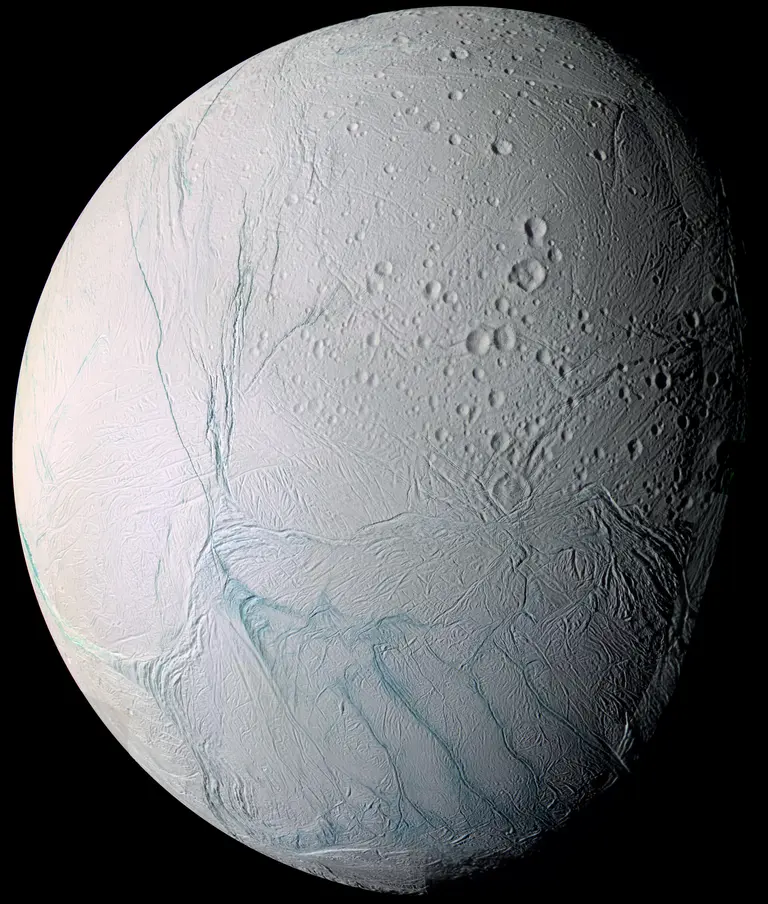 As it swooped past the south pole of Saturn's moon Enceladus on July 14, 2005, Cassini acquired high resolution views of this puzzling ice world. From afar, Enceladus exhibits a bizarre mixture of softened craters and complex, fractured terrains. NASA/JPL/Space Science Institute