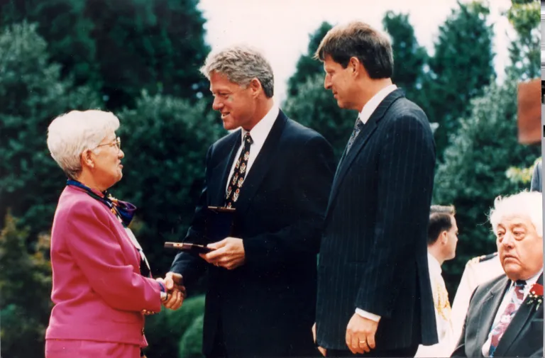 Vera Rubin receiving National Medal of Science from President Clinton and Vice President Gore, White House, Washington DC