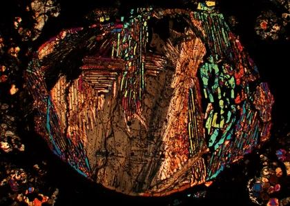 Meteorite thin section courtesy Nicole Xike Nie.