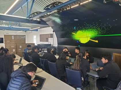 high school students learn about dark matter in the Carnegie Observatories VizLab as part of a DEI Mini-grant funded project