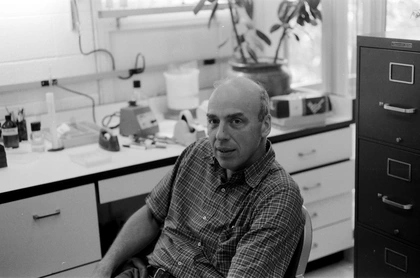 Caption: Donald Brown takes a break in the lab during the 1980s, when his group was investigating how different genes are expressed during embryonic development. Photo is courtesy of the Carnegie Institution for Science.