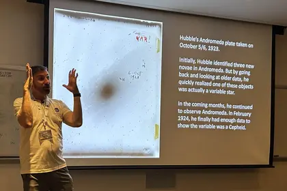 Observatories Director and Carnegie Deputy for Science shares the story of Hubble's discovery at the annual Open House. Photo is courtesy of James Fanson. 