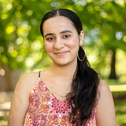 portrait of intern Maulika Masson on the Broad Branch Road campus