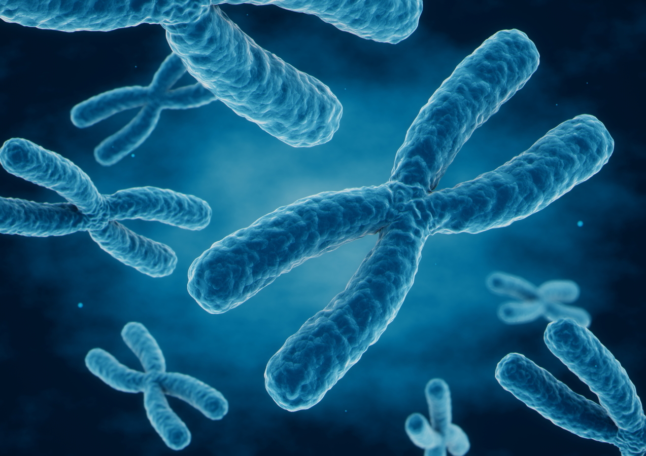 Blue chromosomes floating on a dark background.