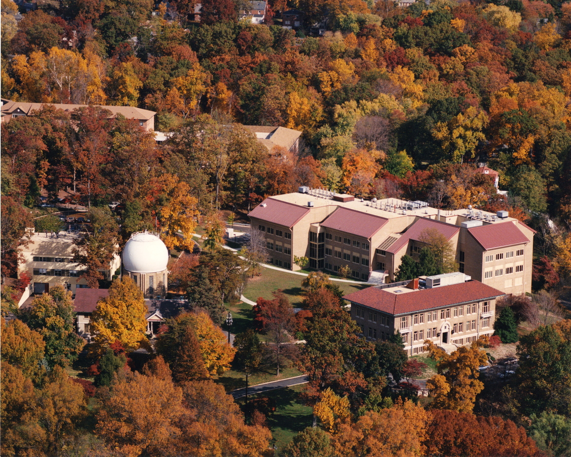 Carnegie Science's Broad Branch Road campus in the fall with brilliant leaves